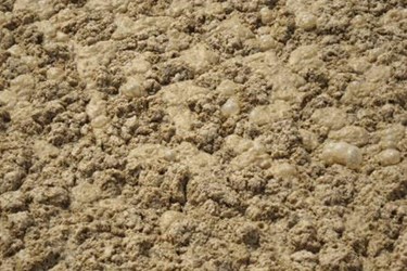 What causes foam in wastewater treatment?